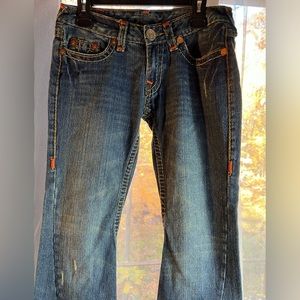 True Religion blue flare jeans with cute thick orange and yellow stitch. Size 29